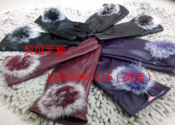 Winter women &#039;s rabbit hair ball PU gloves warm plus cashmere riding a short gloves factory direct