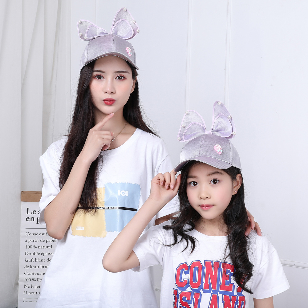 Direct selling parent-child cute lollipop bow baseball cap sunshade cap princess cap cloth cap net cap