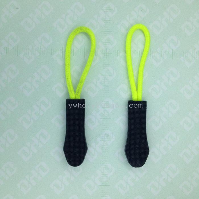 PVC injection molded green plastic bags outside the rope end of the zipper pull tab