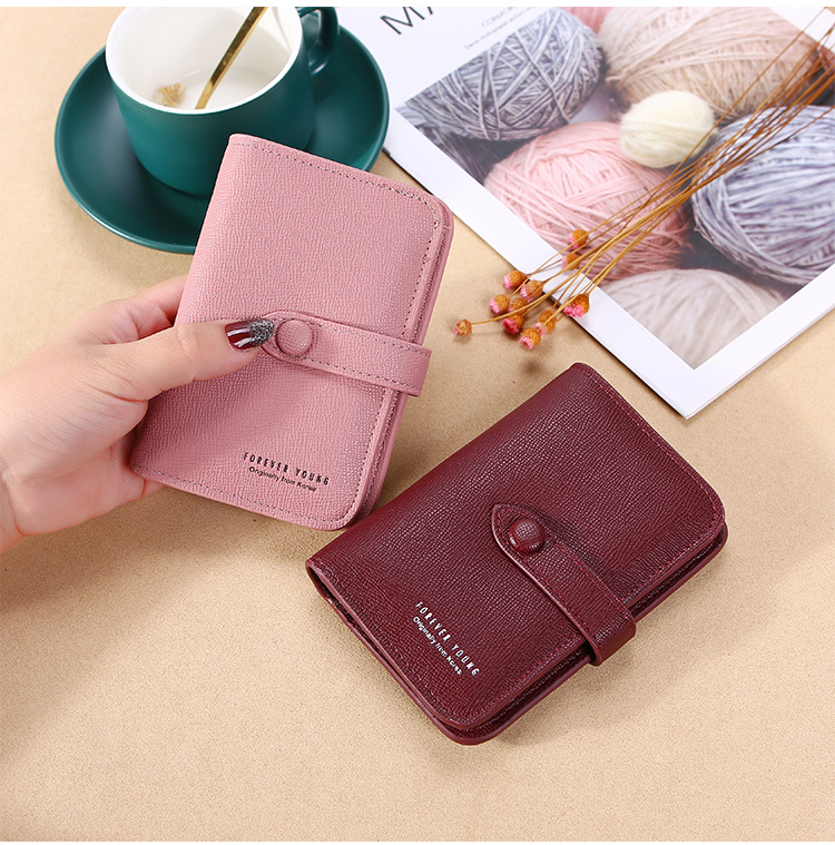 New 2021 Women's Hand-Held Change Key Case Simple Japanese and Korean Buckle Multi-Functional Short Keychain Multiple Card Slots New 2021 Women's Hand-Held Change Key Case Simple Japanese and Korean Buckle Multi-Functional Short Keychain Multiple Card Slots