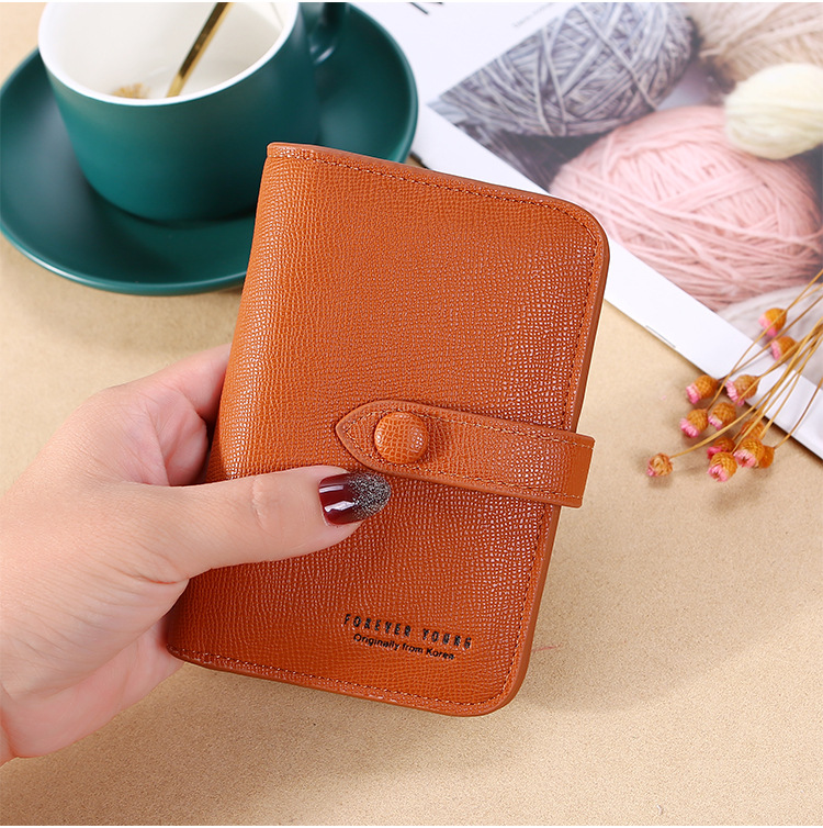New 2021 Women's Hand-Held Change Key Case Simple Japanese and Korean Buckle Multi-Functional Short Keychain Multiple Card Slots New 2021 Women's Hand-Held Change Key Case Simple Japanese and Korean Buckle Multi-Functional Short Keychain Multiple Card Slots