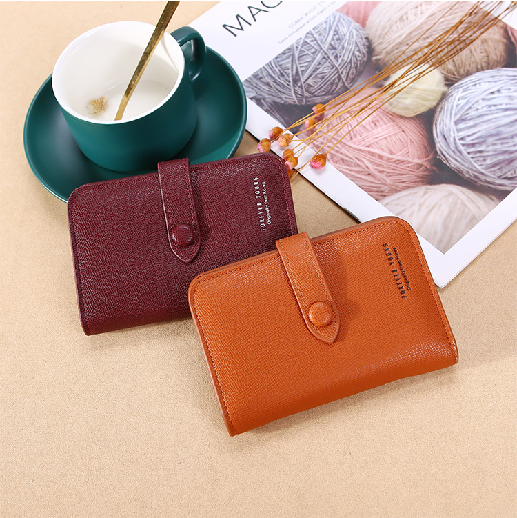 New 2021 Women's Hand-Held Change Key Case Simple Japanese and Korean Buckle Multi-Functional Short Keychain Multiple Card Slots New 2021 Women's Hand-Held Change Key Case Simple Japanese and Korean Buckle Multi-Functional Short Keychain Multiple Card Slots