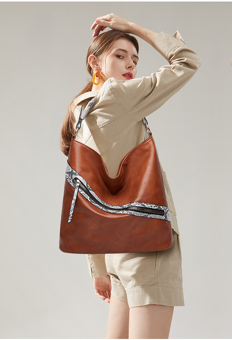 Foreign Trade 2021 Spring/Summer New Bucket Bag Snake Pattern Shoulder Bag Portable Big Bag European and American Fashion Women's Underarm Bag Foreign Trade 2021 Spring/Summer New Bucket Bag Snake Pattern Shoulder Bag Portable Big Bag European and American Fashion Women's Underarm Bag