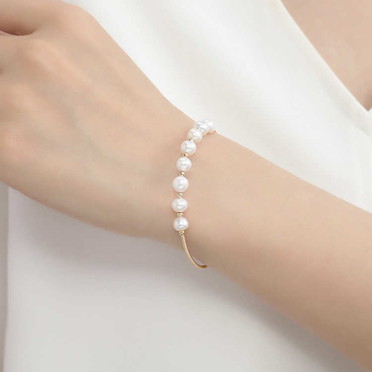 New High Quality 18K Gold Natural Freshwater Pearl Bracelet Ten plus Nine Gold round Beads New High Quality 18K Gold Natural Freshwater Pearl Bracelet Ten plus Nine Gold round Beads