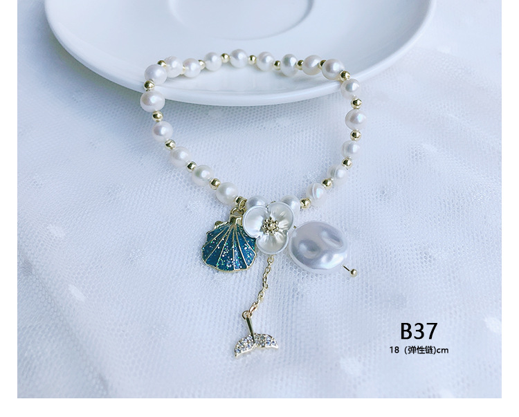 New bracelet hand natural freshwater pearl crystal strawberry crystal shell fish elastic adjustable girl New bracelet hand natural freshwater pearl crystal strawberry crystal shell fish elastic adjustable girl