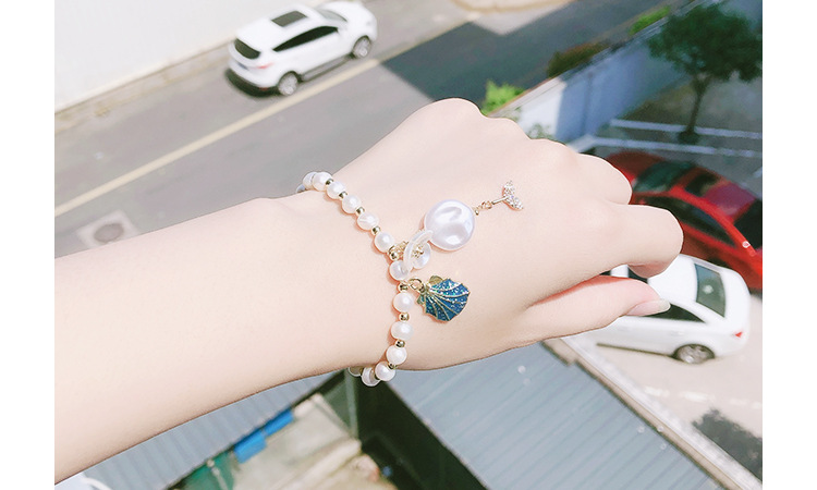 New bracelet hand natural freshwater pearl crystal strawberry crystal shell fish elastic adjustable girl New bracelet hand natural freshwater pearl crystal strawberry crystal shell fish elastic adjustable girl