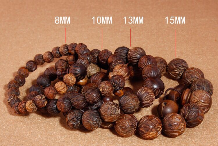 Authentic natural high - grade carved lotus camphor wood fish buddhist beads bracelet camphor wood hand string wooden buddhist beads jewelry for men and women Authentic natural high - grade carved lotus camphor wood fish buddhist beads bracelet camphor wood hand string wooden buddhist beads jewelry for men and women