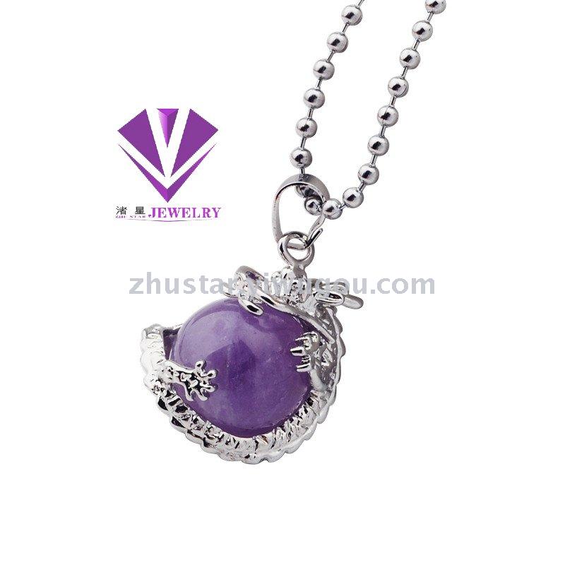 Natural stone, crystal, amethyst, agate, opal, tiger eye stone, dragon holding beads pendant. Natural stone, crystal, amethyst, agate, opal, tiger eye stone, dragon holding beads pendant.