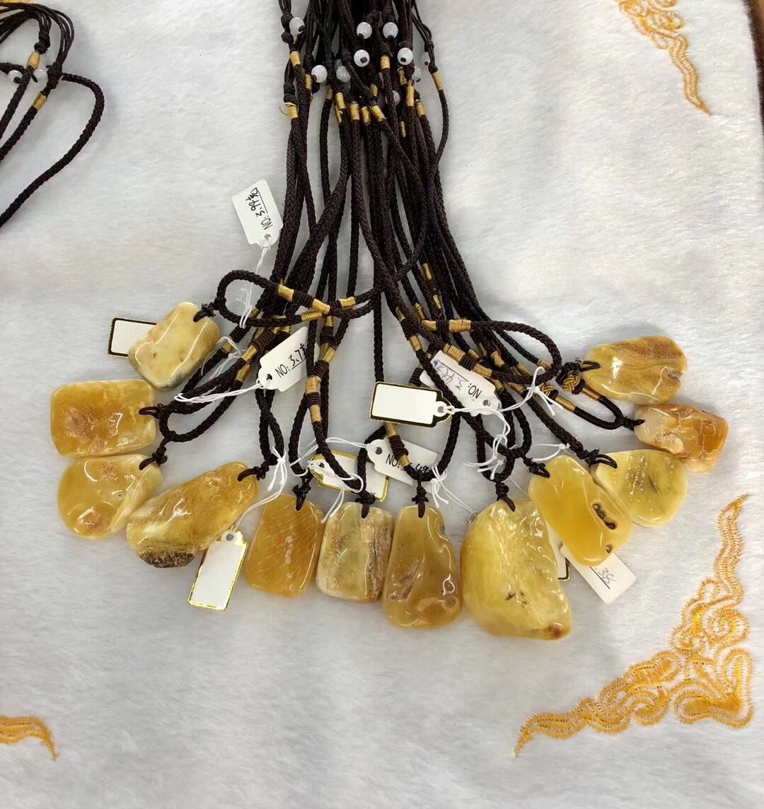 All natural Russian amber beeswax pendant necklace small gram heavy pendant needs good currency All natural Russian amber beeswax pendant necklace small gram heavy pendant needs good currency