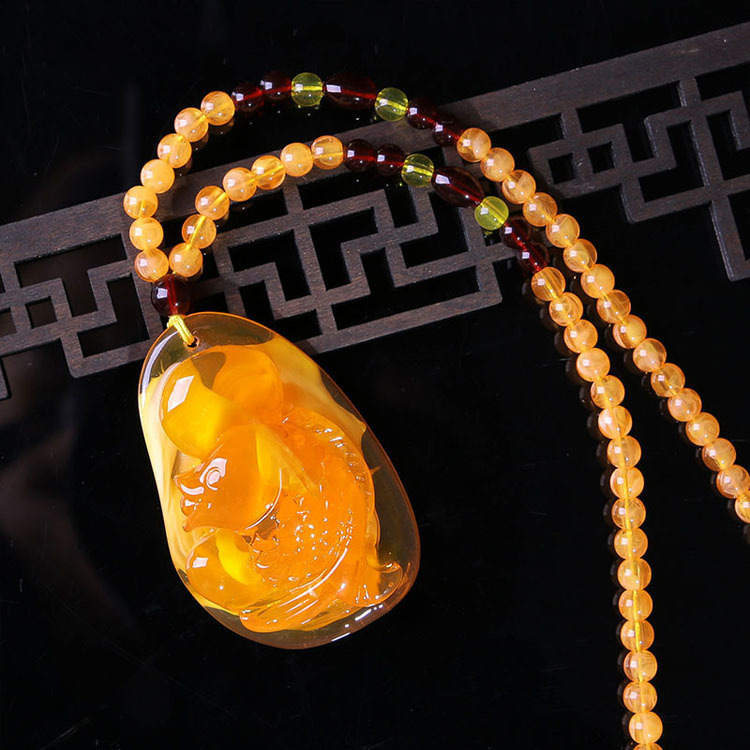 2020 New Retro Imitation Beeswax Yellow Chicken Grease Water Drop Pendant Creative Year Fish Necklace Sweater Chain Jewelry