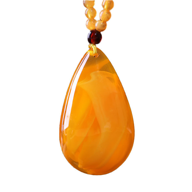 2020 New Retro Imitation Beeswax Yellow Chicken Grease Water Drop Pendant Creative Year Fish Necklace Sweater Chain Jewelry