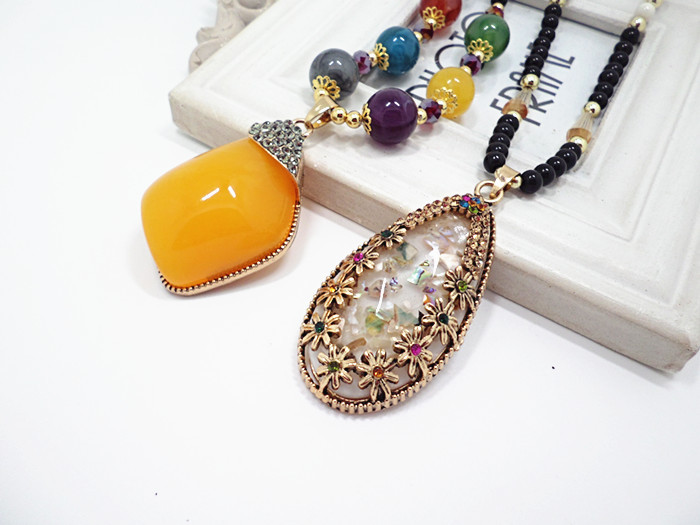 European and American National Style Original Imitation Beeswax Color Shell Long Sweater Chain Autumn Winter Retro Water Drop Necklace Necklace Wholesale European and American National Style Original Imitation Beeswax Color Shell Long Sweater Chain Autumn Winter Retro Water Drop Necklace Necklace Wholesale