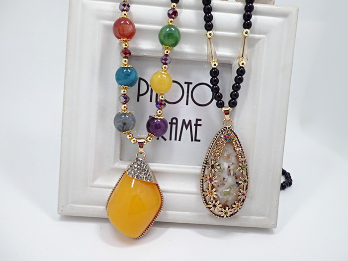European and American National Style Original Imitation Beeswax Color Shell Long Sweater Chain Autumn Winter Retro Water Drop Necklace Necklace Wholesale European and American National Style Original Imitation Beeswax Color Shell Long Sweater Chain Autumn Winter Retro Water Drop Necklace Necklace Wholesale
