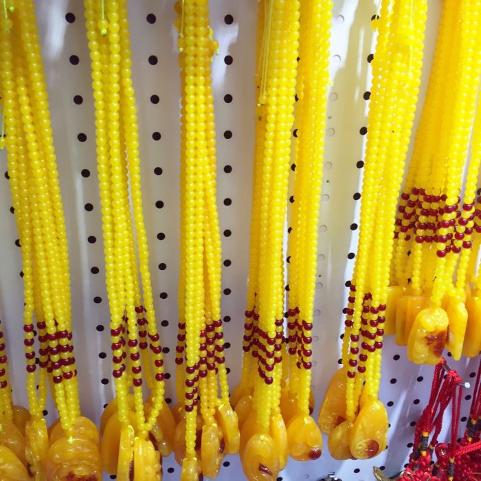 The two generation of beeswax necklace with fluorescent floating factory direct saline