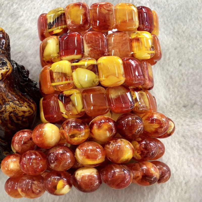 Beeswax hand string national wind amber br women's single circle chicken oil yellow flat bead bracelet pendant Beeswax hand string national wind amber br women's single circle chicken oil yellow flat bead bracelet pendant