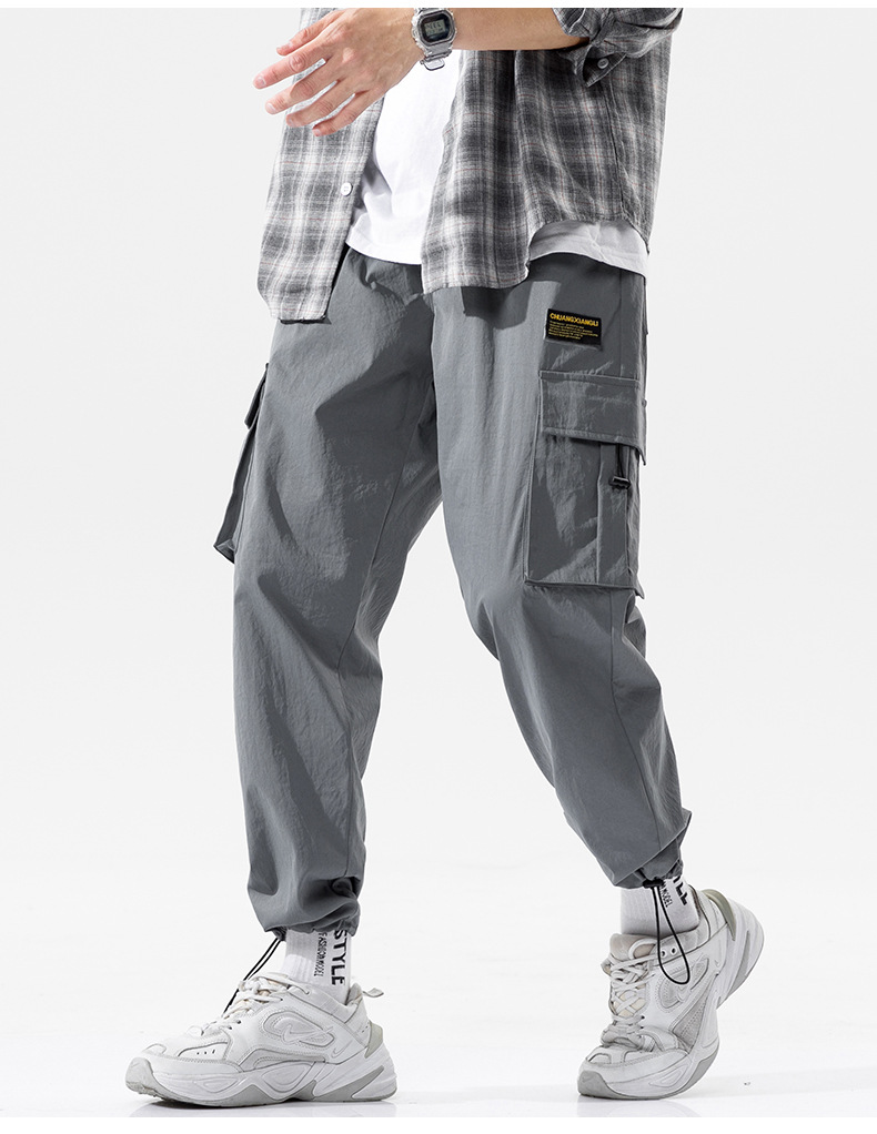 Overalls Men's Autumn and Winter Pocket Loose Tappered Harem Hong Kong Style All-Matching Fashion Brand Sports Men Casual Cropped Trousers Overalls Men's Autumn and Winter Pocket Loose Tappered Harem Hong Kong Style All-Matching Fashion Brand Sports Men Casual Cropped Trousers