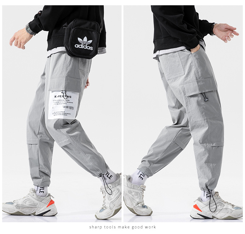 Overalls Men's Autumn and Winter Pocket Loose Tappered Harem Hong Kong Style All-Matching Fashion Brand Sports Men Casual Cropped Trousers Overalls Men's Autumn and Winter Pocket Loose Tappered Harem Hong Kong Style All-Matching Fashion Brand Sports Men Casual Cropped Trousers