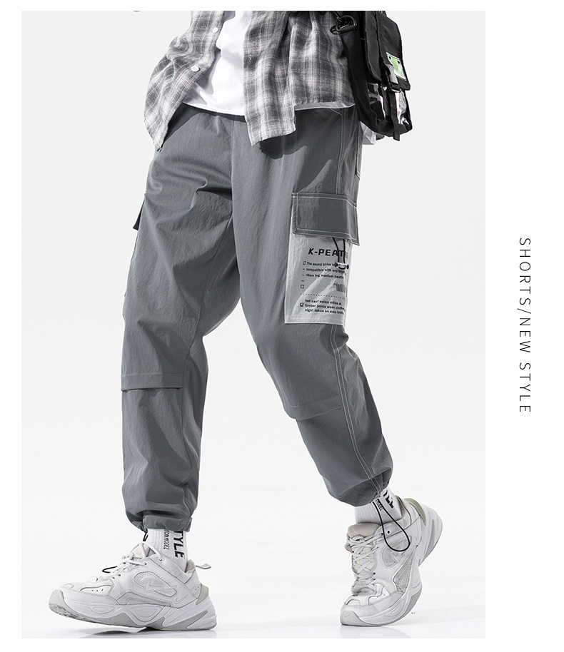 Overalls Men's Autumn and Winter Pocket Loose Tappered Harem Hong Kong Style All-Matching Fashion Brand Sports Men Casual Cropped Trousers Overalls Men's Autumn and Winter Pocket Loose Tappered Harem Hong Kong Style All-Matching Fashion Brand Sports Men Casual Cropped Trousers