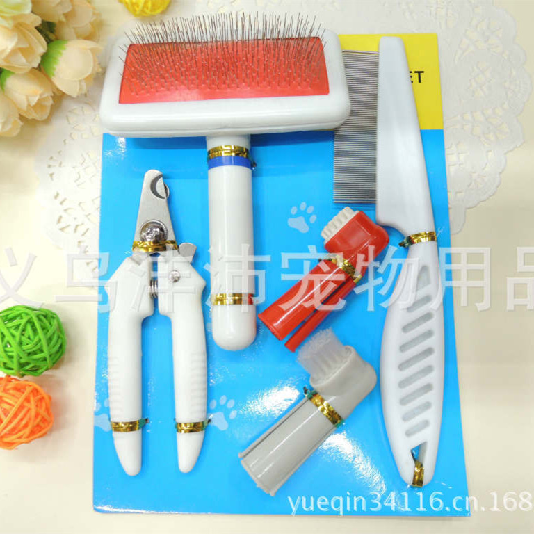 Four-piece dog cat pet grooming pet pet brush set cut pet toothbrush small grate