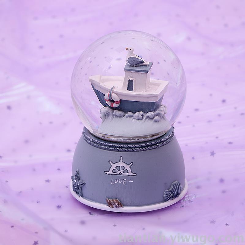 The whole family has excellent presents a couple holding hands with a crystal ball music box dreamlike glow Snowflake music box