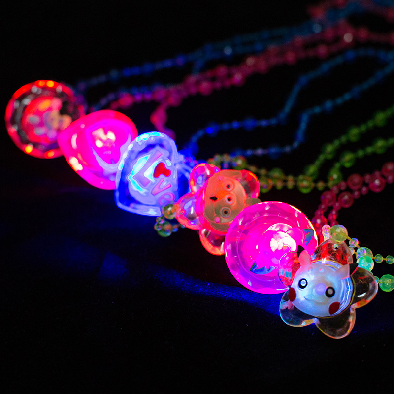 The ground stall sells novelty toys to shine necklace led flash yakeli bead cartoon pendant child gift The ground stall sells novelty toys to shine necklace led flash yakeli bead cartoon pendant child gift