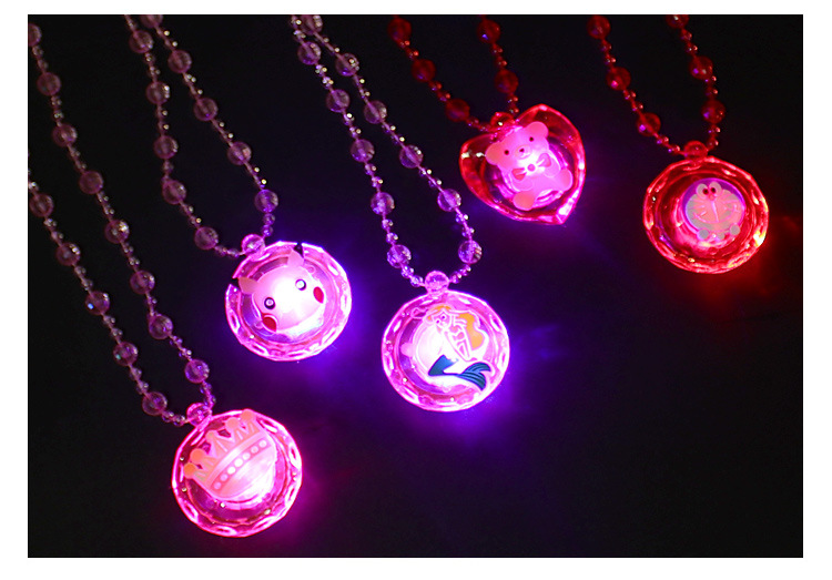 The ground stall sells novelty toys to shine necklace led flash yakeli bead cartoon pendant child gift The ground stall sells novelty toys to shine necklace led flash yakeli bead cartoon pendant child gift