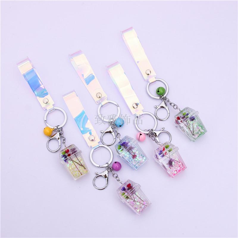 Acrylic environment-friendly dustbin dried flowers into liquid oil quicksand key chain creative car key chain bag pendant