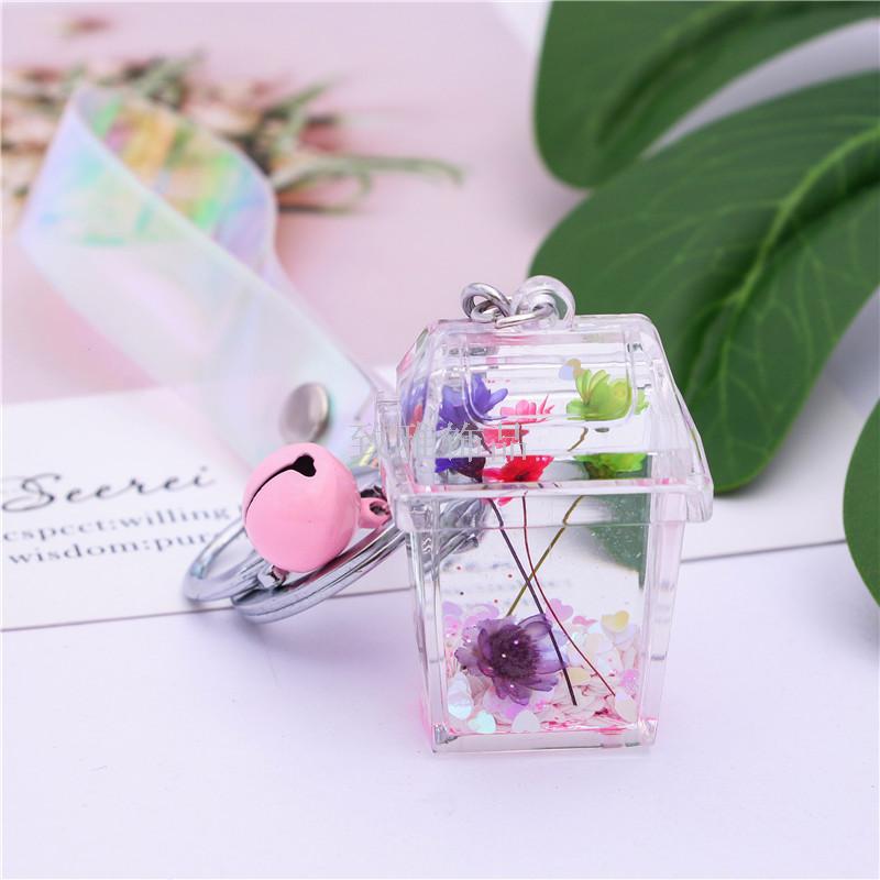 Acrylic environment-friendly dustbin dried flowers into liquid oil quicksand key chain creative car key chain bag pendant