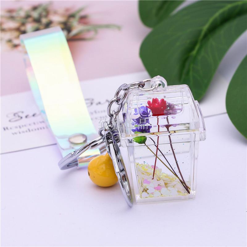 Acrylic environment-friendly dustbin dried flowers into liquid oil quicksand key chain creative car key chain bag pendant