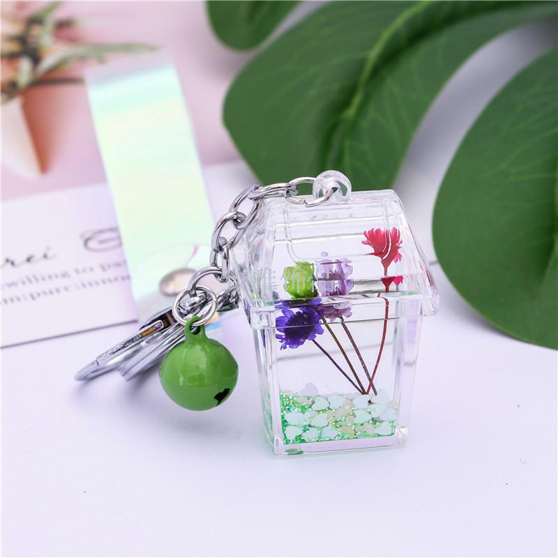 Acrylic environment-friendly dustbin dried flowers into liquid oil quicksand key chain creative car key chain bag pendant