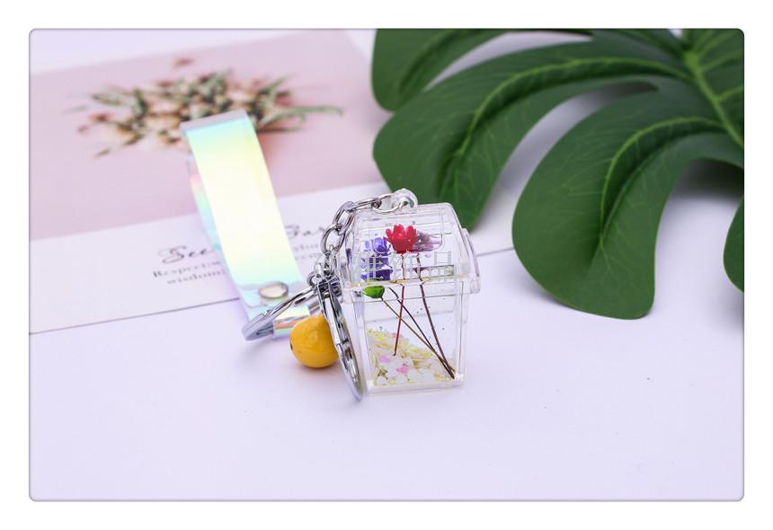 Acrylic environment-friendly dustbin dried flowers into liquid oil quicksand key chain creative car key chain bag pendant Acrylic environment-friendly dustbin dried flowers into liquid oil quicksand key chain creative car key chain bag pendant