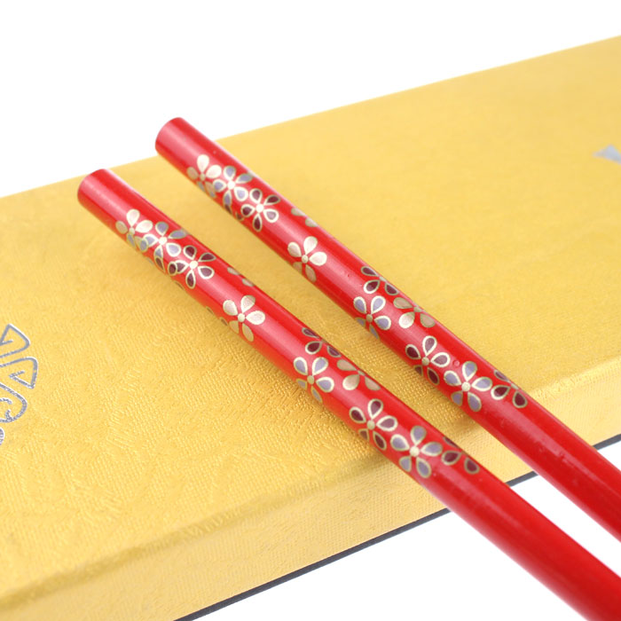 Senior boxed festive with chopsticks