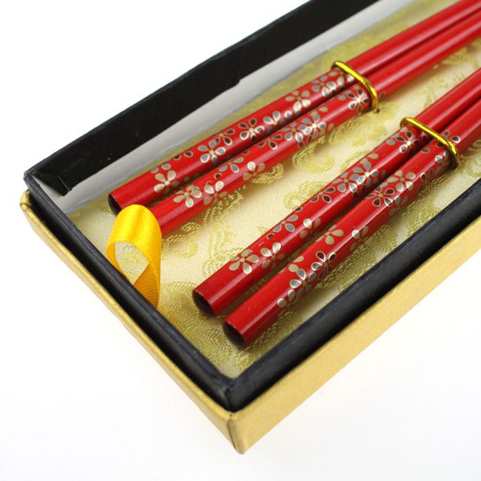 Senior boxed festive with chopsticks