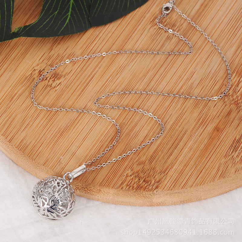Female pregnant woman jingwen ball essence oil bottle invisible button hollow out flower magic box aroma phase box sweater necklace pendant