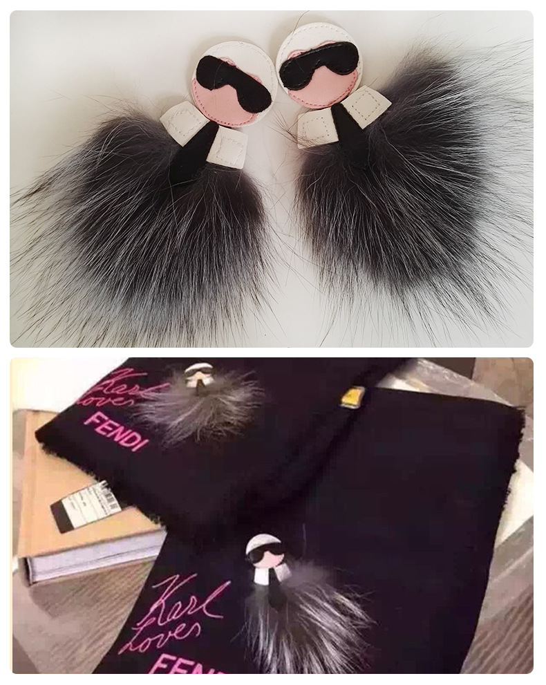 A: The old Buddha head is a picture of The fox hair piece of The bag a piece of fur The key of The hair key to hang a piece of clothing accessories. A: The old Buddha head is a picture of The fox hair piece of The bag a piece of fur The key of The hair key to hang a piece of clothing accessories.
