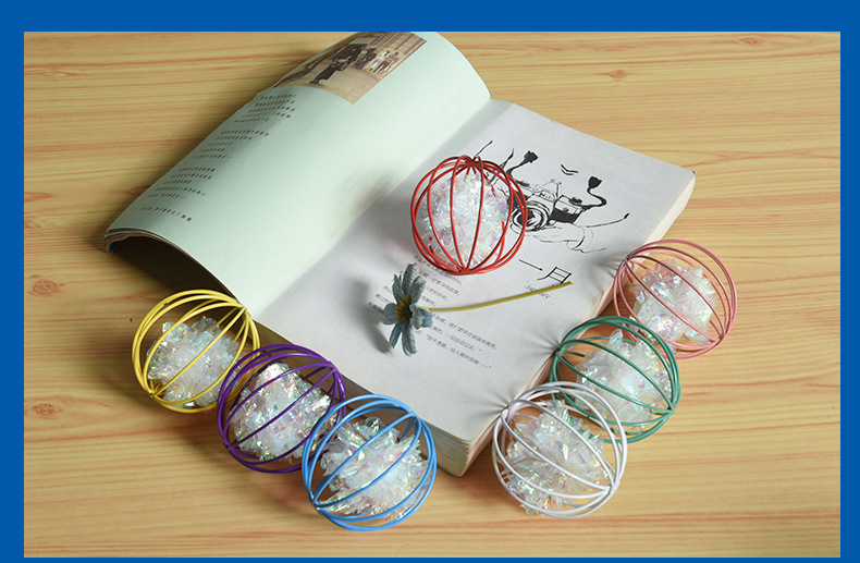 Pet Cat Toy Color Funny Cat Prisoner's Cage Ringing Paper Ball Yizhi Sound Paper Ball Laser Film Interactive Bite Toy Wholesale