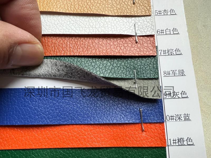 Waterproof Lychee Pattern Thin Artificial Leather with Spunlace Bottom for Handbags, Backpacks, Leather Cases, Etc. Waterproof Lychee Pattern Thin Artificial Leather with Spunlace Bottom for Handbags, Backpacks, Leather Cases, Etc.