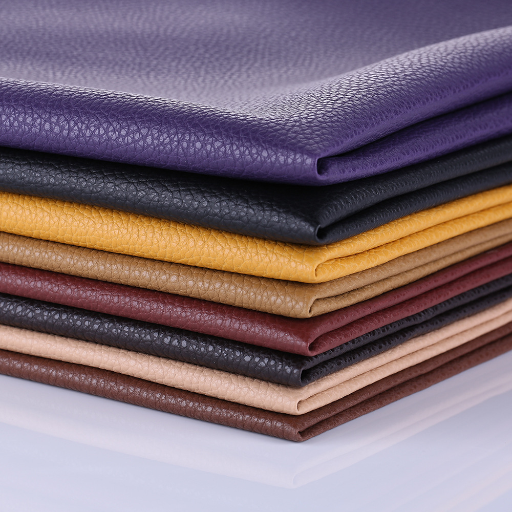 Factory in Stock Wholesale 0.7pu Large Litchi Leather Fabric Sofa Seat Cushion Bedside Soft Upholstery Background Wall Artificial Leather
