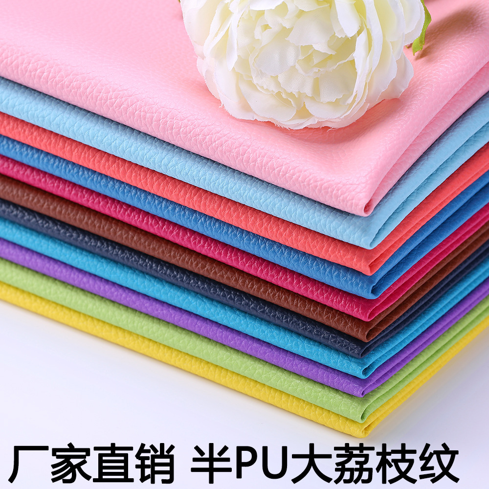 Factory in Stock Wholesale 0.7pu Large Litchi Leather Fabric Sofa Seat Cushion Bedside Soft Upholstery Background Wall Artificial Leather