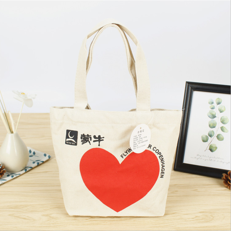 The manufacturer produces Mengniu packing cotton canvas bag, custom made hand cotton bag, custom made LOGO environment-friendly shopping bag