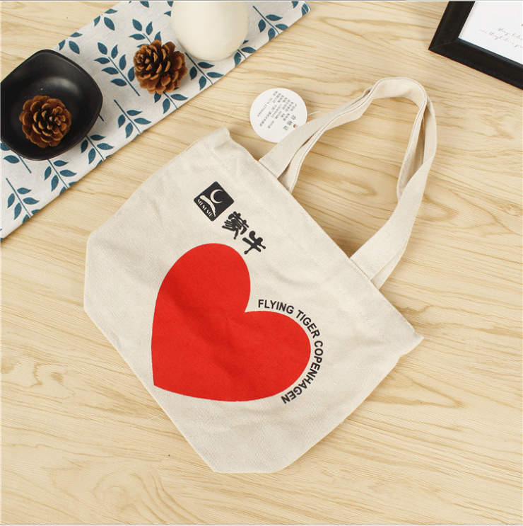 The manufacturer produces Mengniu packing cotton canvas bag, custom made hand cotton bag, custom made LOGO environment-friendly shopping bag