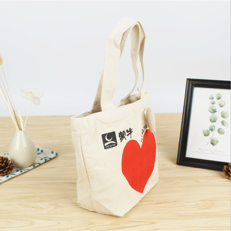 The manufacturer produces Mengniu packing cotton canvas bag, custom made hand cotton bag, custom made LOGO environment-friendly shopping bag The manufacturer produces Mengniu packing cotton canvas bag, custom made hand cotton bag, custom made LOGO environment-friendly shopping bag