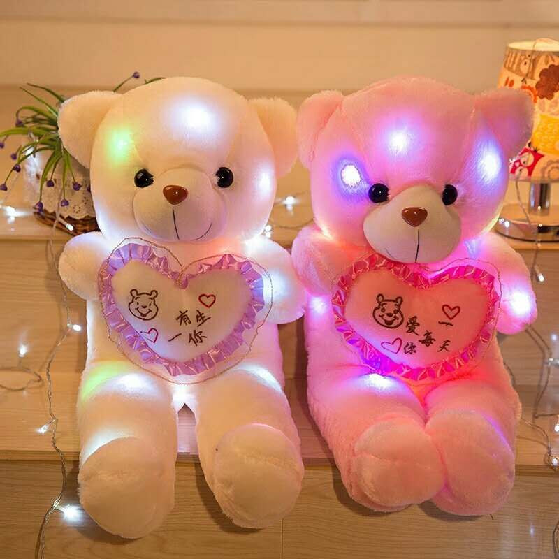 Plush toy bear light holds the heart lettering love you happy every day Teddy bear