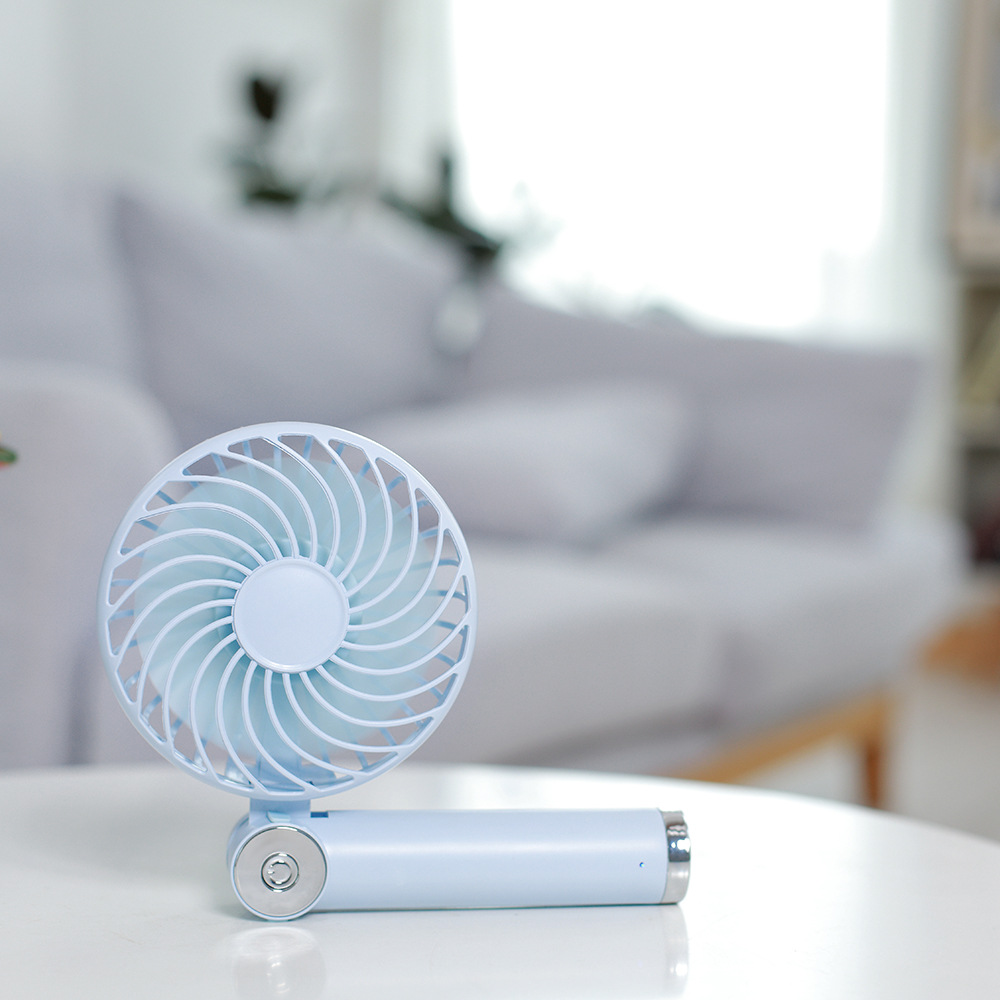 Rotary folding small fan USB charging handheld mini desktop small fan with charging pad function Rotary folding small fan USB charging handheld mini desktop small fan with charging pad function