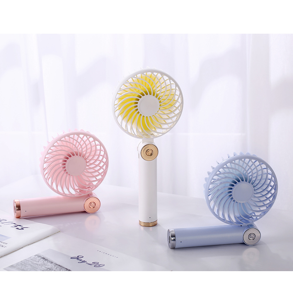 Rotary folding small fan USB charging handheld mini desktop small fan with charging pad function Rotary folding small fan USB charging handheld mini desktop small fan with charging pad function