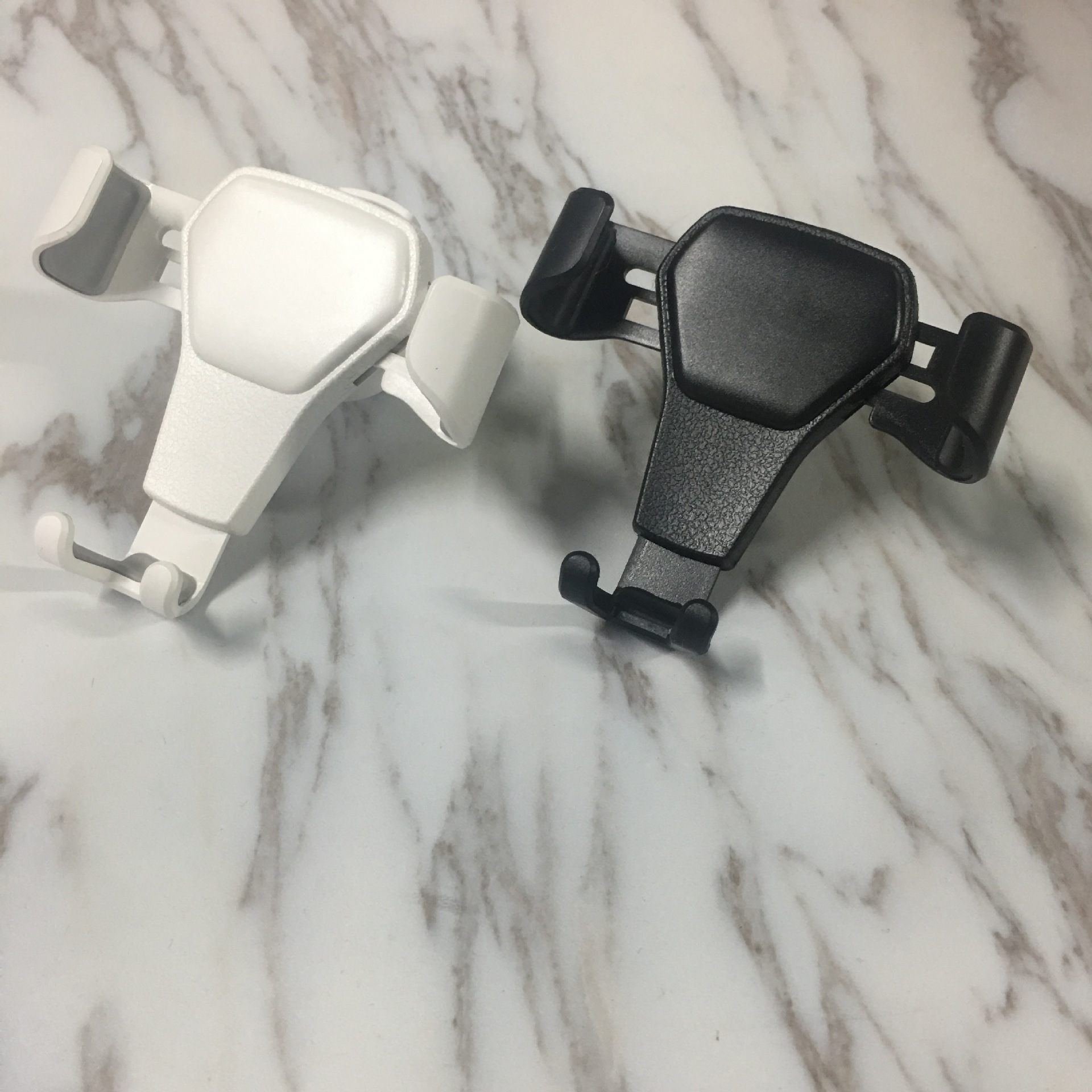 Vehicle-mounted mobile phone bracket Vehicle outlet gravity bracket general leather car bracket navigator bracket Vehicle-mounted mobile phone bracket Vehicle outlet gravity bracket general leather car bracket navigator bracket