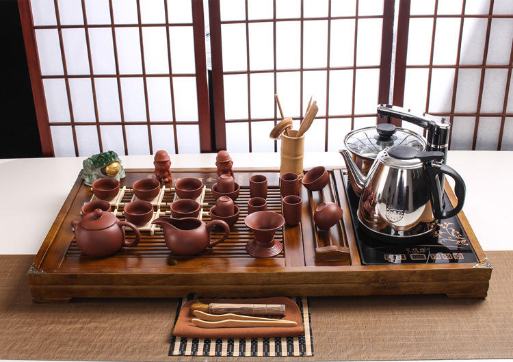 Black Gold Stone Tea Tray Yixing Purple Sand Tea Set Solid Wood Tea Tray FourInOne Induction Cooker Special Gift Whole Black Gold Stone Tea Tray Yixing Purple Sand Tea Set Solid Wood Tea Tray FourInOne Induction Cooker Special Gift Whole
