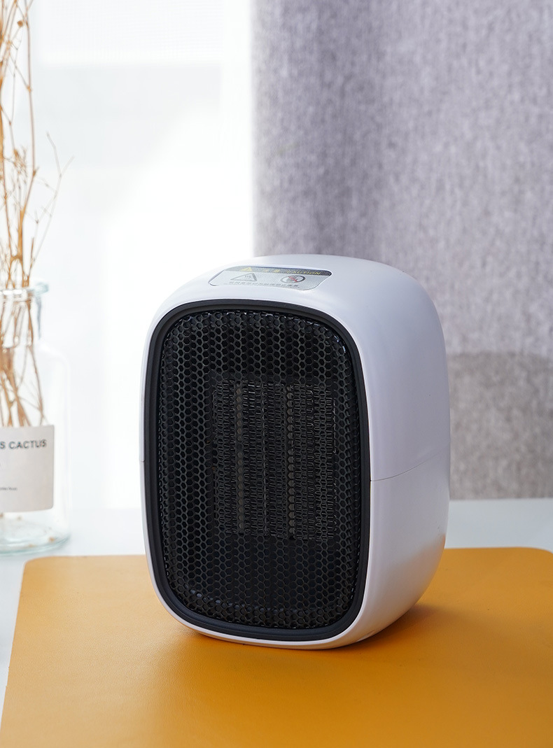 New Warm Air Blower Mini Household Small Heater Office Desk Surface Panel Electric Heater Gift One Piece Dropshipping New Warm Air Blower Mini Household Small Heater Office Desk Surface Panel Electric Heater Gift One Piece Dropshipping