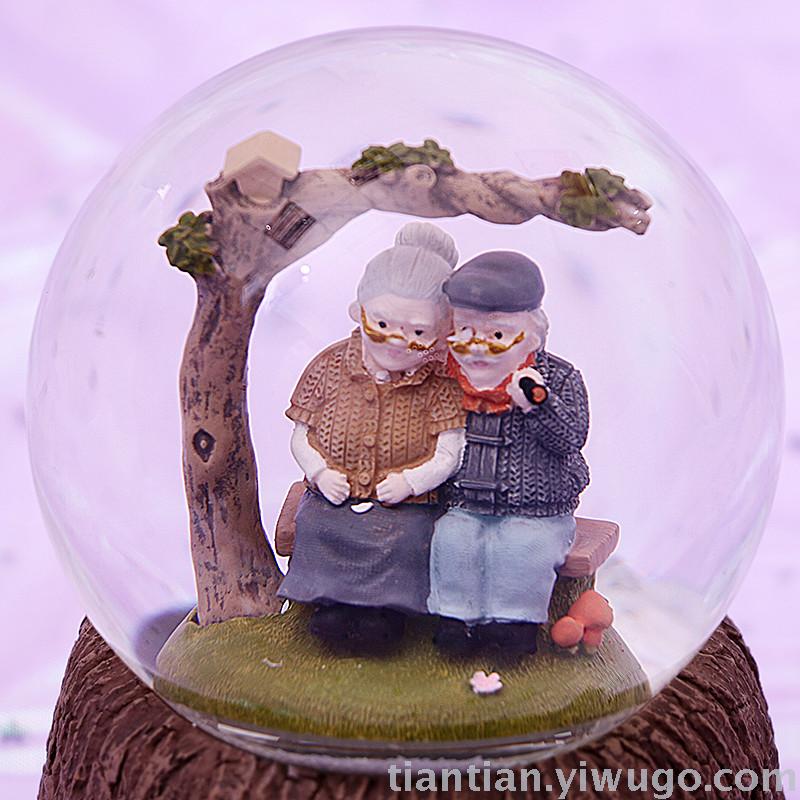 Resin crafts set up a couple old lady Crystal ball music box dream luminous snowflake music box Resin crafts set up a couple old lady Crystal ball music box dream luminous snowflake music box