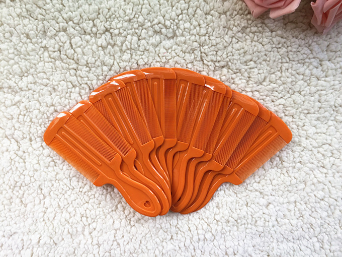 Plastic handle grate with double-sided fine tooth comb yuan store wholesale and direct commodity manufacturers